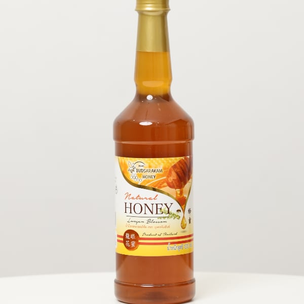 น้ำผึ้งดอกลำไยแท้ ขนาด 1000 กรัม ตราบุษราคัมฮันนี่